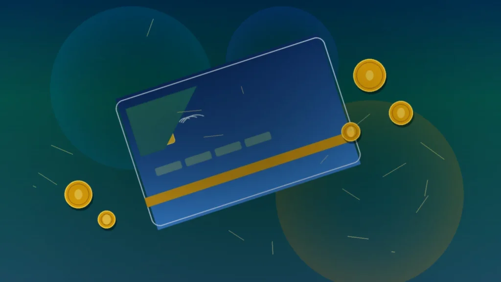 Tarjeta de crédito azul y monedas doradas como símbolos de cashback y recompensas